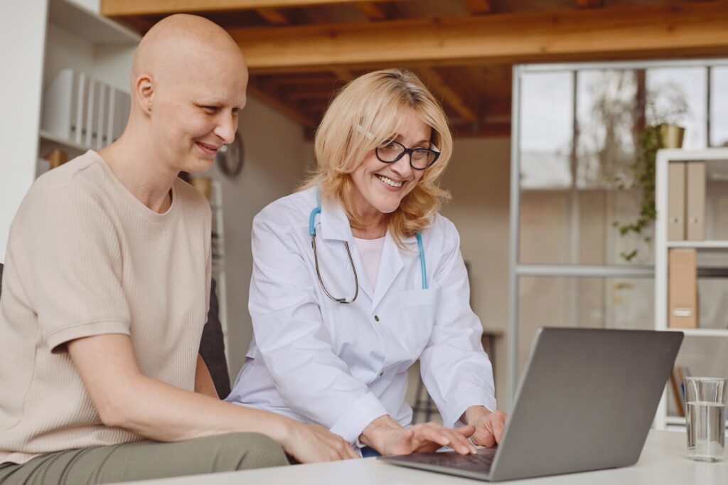 Female Doctor Talking to Patient in Clinic